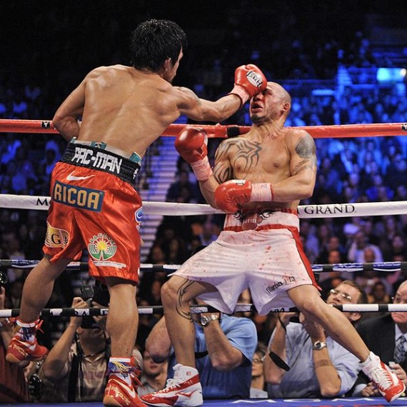 manny-pacquiao-miguel-cotto-ap-mark-terrill-570x570