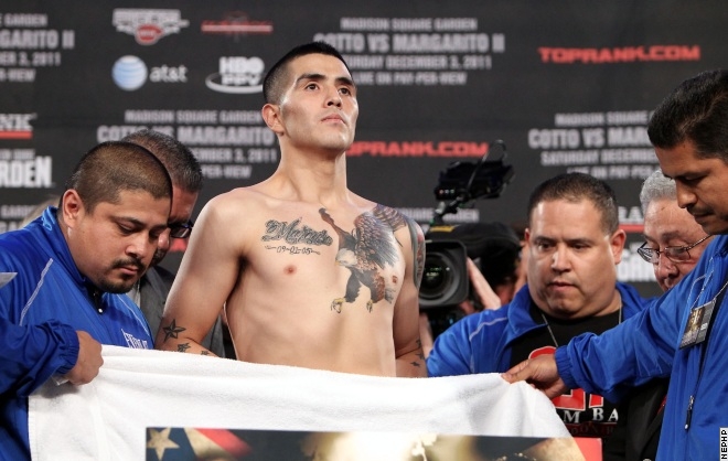 Rios_Murray_weighin_111202_001a Rios failing to make the 135 limit