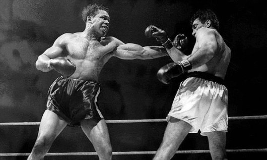 Archie Moore (left)