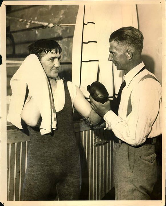 Mike O'Dowd, left, stands beside his trainer